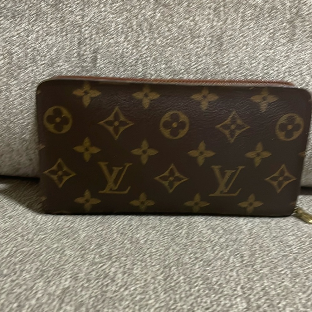 Louis Vuitton zip wallet. Good condition.